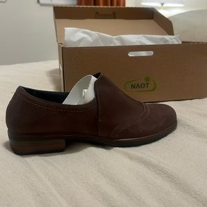 Brand new, never worn still in box and original wrapping